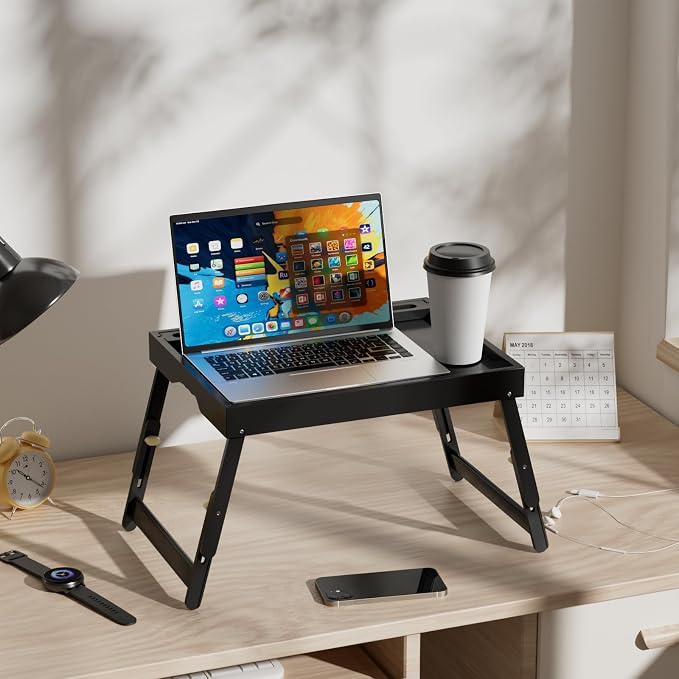 Artmeer Adjustable Bamboo Bed Tray Table with Device Slot, Large, Black | Adjustable FSC-certified bamboo bed tray with device slot, folding legs and handles for meals, laptops and reading in bed.