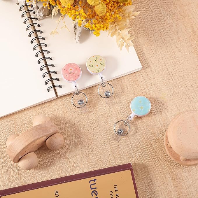 BESARME 3 Pack Retractable Badge Reels with Key Ring, Daisy | Cute daisy design, 22.8 in retractable cord, sturdy clip, for ID badges and keys, nurse teacher office use